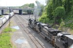 NS units making smoke as they drag a train  into Enola yard